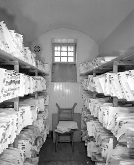 Interior. View of cell used as archive store
