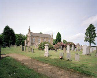 View from SE showing church and churchyard.