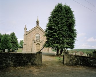 View from SW showing main entrance and gateway.