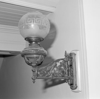 Interior.
Detail of electrified oil lamp and bracket.