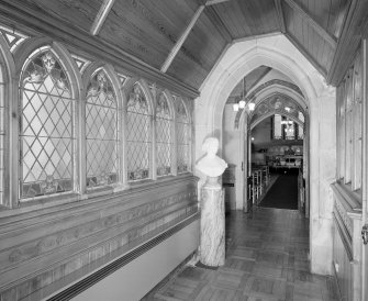 Interior. View of interior of link corridor from North looking into chapel with portrait bust
