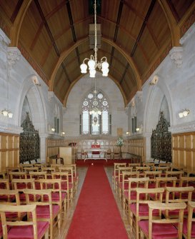 Interior. View of chapel from North looking towards the communion table showing the ornate wrought iron gates to the transepts