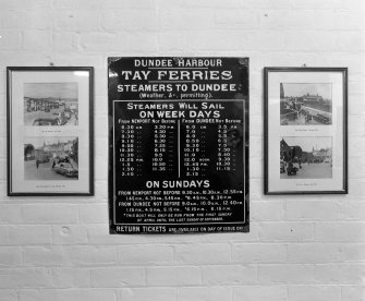 Detail of old enamel sign (on the wall of the ferry terminal offices) providing information on ferry times