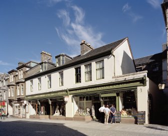 View of 'Peter Maclennan & Co. Ltd.' shopfront from WSW