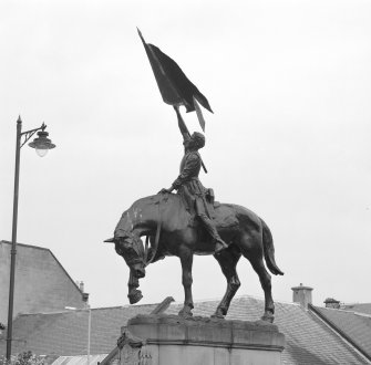View of statue commemorating the return of Hawick callants from Holnshole in 1514 by W F Beattie (1914) from SE