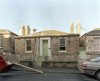 View from East South East showing street frontage, garden walls and gates