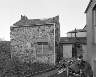 View of wash house from South South West showing brick skews and chimney