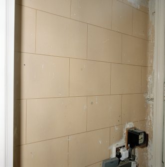 Interior. Detail of lined as ashlar stone effect in entrance hall