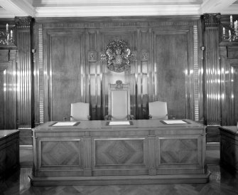 Interior. 7th floor Board room Detail of desk and crest