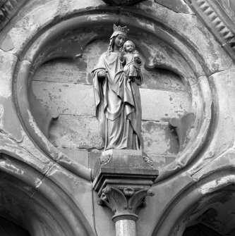 Detail of sculptureof the Virgin and child above the principal doorway