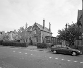 View of original manse from North West and link block to church