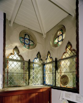 Interior.
Detail of corner stained glass windows in session room to E.