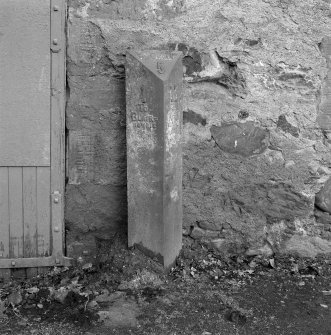 Detail of cast-iron mile post situated to the E side of the mill