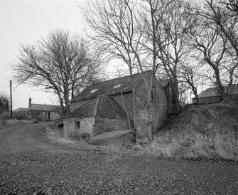 View from NW of W side of mill, also showing gable at the bottom of which there was previously a water wheel