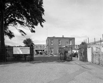 General view from E of main gate (from Granton Park Avenue), with offices (background right)