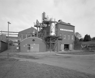 View from S of Evaporator House, with recently added evaporator unit on outside of building (all the remainder being inside).  This unit was acquired second-hand, and was built in Glasgow in 1933