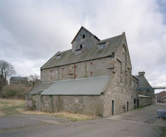 View from SW of barley silos at W end of block of former floor maltings, built in 1857 and re-built in 1914