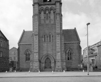 View from E showing body of church and first stage of tower