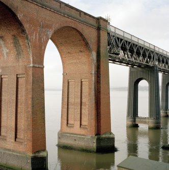 Detailed view from SE showing the point at which the main steel portion of the bridge meets the brick viaduct at its south end.