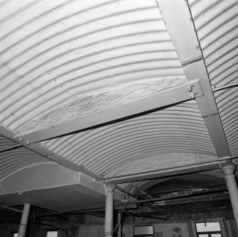 Interior. Detail of corrugated-iron vault and cast-iron beams on 4th floor