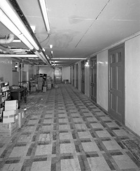 Interior. Basement cells in main block from NE
