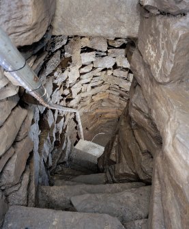 View down lower flight of steps to cistern, after installation of handrail.
