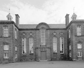 View of main entrance in central bays of NW elevation.