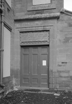 Detail of doorway to Villa Block 1 with inscription "COME UNTO ME ALL YE THAT LABOUR AND ARE HEAVY LADEN AND I WILL GIVE YOU REST"