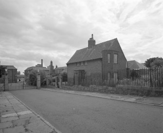 View central gate and janitors house from West