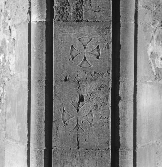 South range, chapel, detail of carved crosses