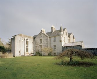 View from West showing facade of original 18th century house with kitchen wing.