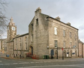 View from North West showing 32 St John Street, the courthouse with the assembley hall and the steeple behind