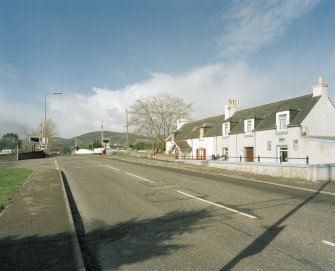 Inverness, Tomnahurich Swing Bridge over Caledonian Canal
Distant view of bridge from east, with neighbouring terrace of houses (right)