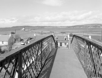 Inverness, Clachnaharry Railway Station, Footbridge
View from the south-south-east, taken from the top decking of the railway footbridge, looking out over the Beauly Firth, with the sea lock basin and the Sea Lock in the middle distance