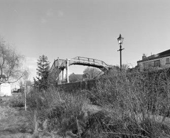 Inverness, Clachnaharry Railway Station, Footbridge
View from the north-west showing the wrought-iron lattice worked footbridge over the railway line