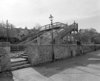 Inverness, Clachnaharry Railway Station, Footbridge
View from the south-east showing the wrought-iron lattice worked footbridge over the railway line