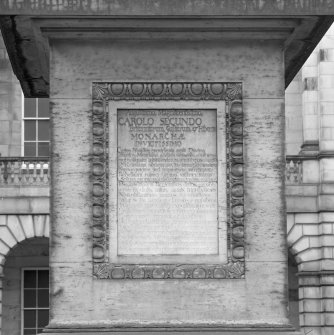Detail of plaque on plinth.