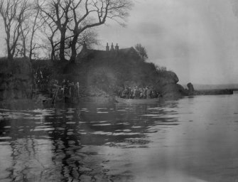 Unidentified view of lochside house.
