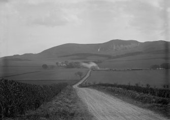 View along country road (Swanston Road), looking south towards Swanston Village and the Pentland Hills