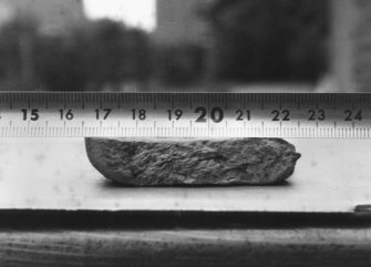Clay mould for the escutcheon of a hanging bowl from Craig Phadrig 1971 excavation. Section view, scale in cms. In MS7262/5