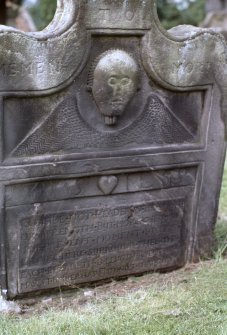 View of headstone dated 1759 with winged soul, Dollar Old Parish Churchyard.
