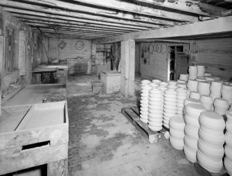 Edinburgh, Portobello, Pipe Street, Thistle Potteries Street.
Interior view of store adjacent to dipping-houses, with detail of brick floor.