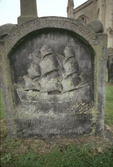 View of headstone to James Muir d. 1761 with carved sailing ship, Larbert Old Churchyard.
