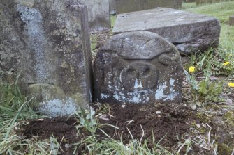 View of part buried headstone, Larbert Old Churchyard.
