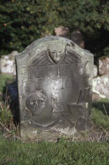 View of headstone dated 1754 with IG, IG, TG and MG grave symbols, Logie Old Churchyard.