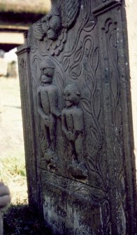 View of headstone with carving of McMonies children d. 1790-93, Kirkandrews Old Church burial ground.