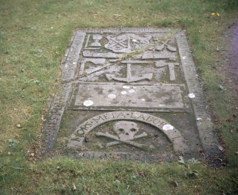 Detail of graveslab 1629 with anchor of mariner and tools of shipwright, Michael Kirk burial ground, Gordonstoun.