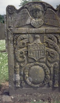 View of headstone with angel and armorial shield, Newdosk   Parish Church burial ground.
