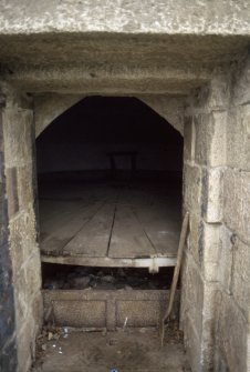 Detail of entrance to morthouse showing steps and shelving, Udny Parish Church burial ground.