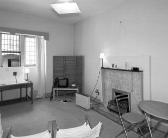 Interior view of Glasgow School of Art showing basement living room in visitor's flat from NW.